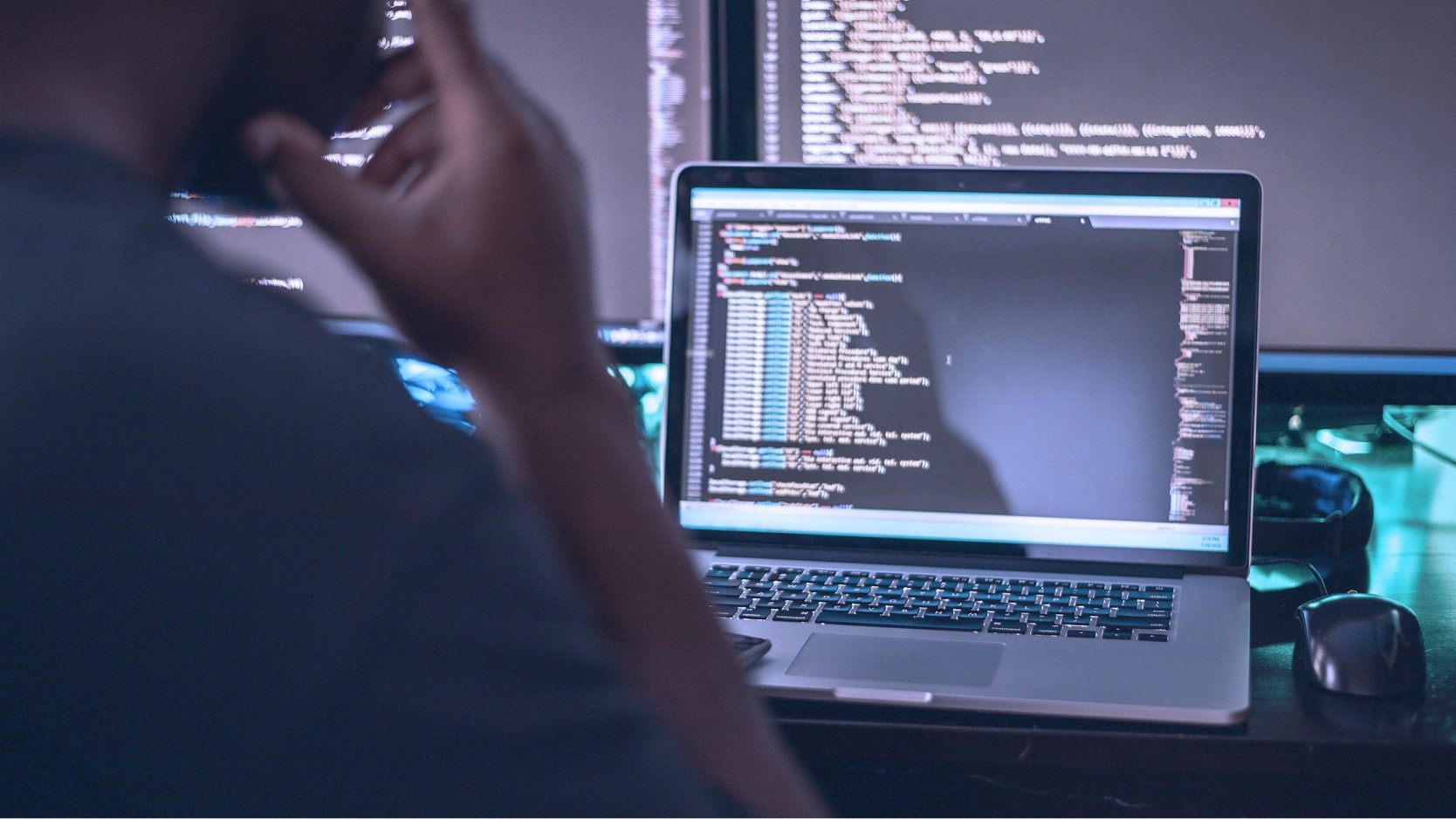 Developer working with a laptop. 