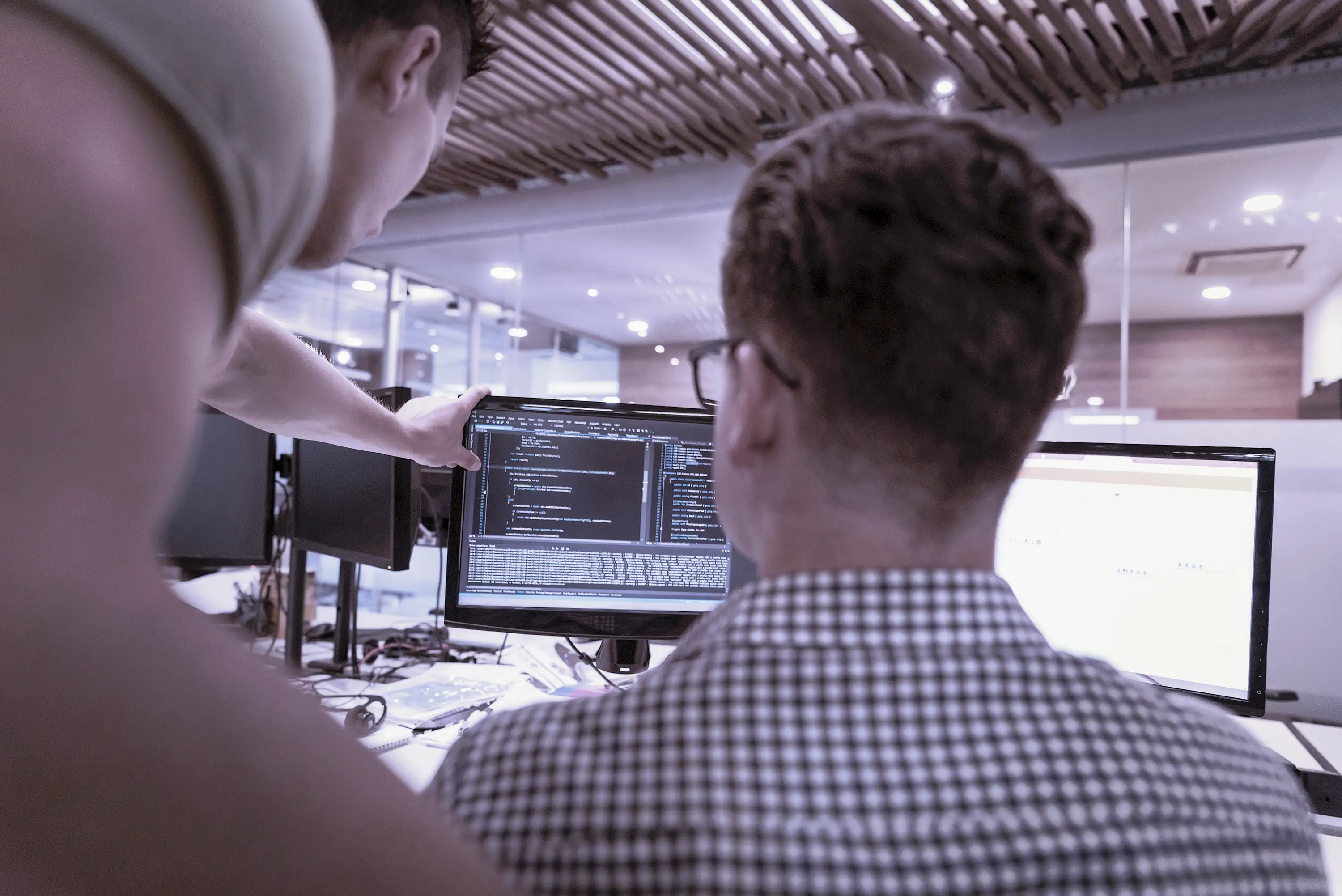 Colleagues working together in a brightly lit office
