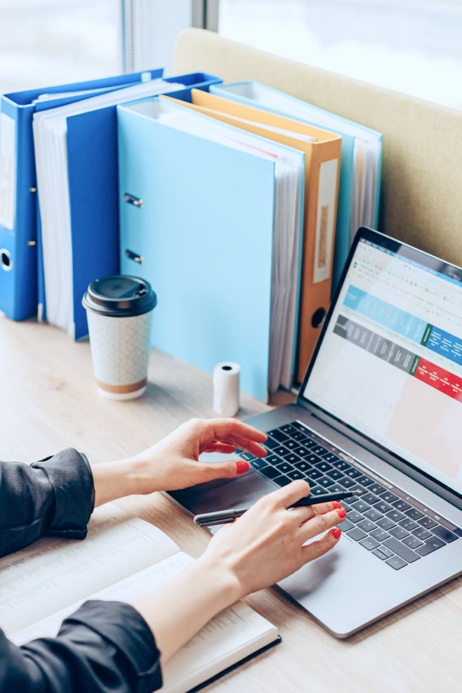 Colleague working on a project planning spreadsheet. 