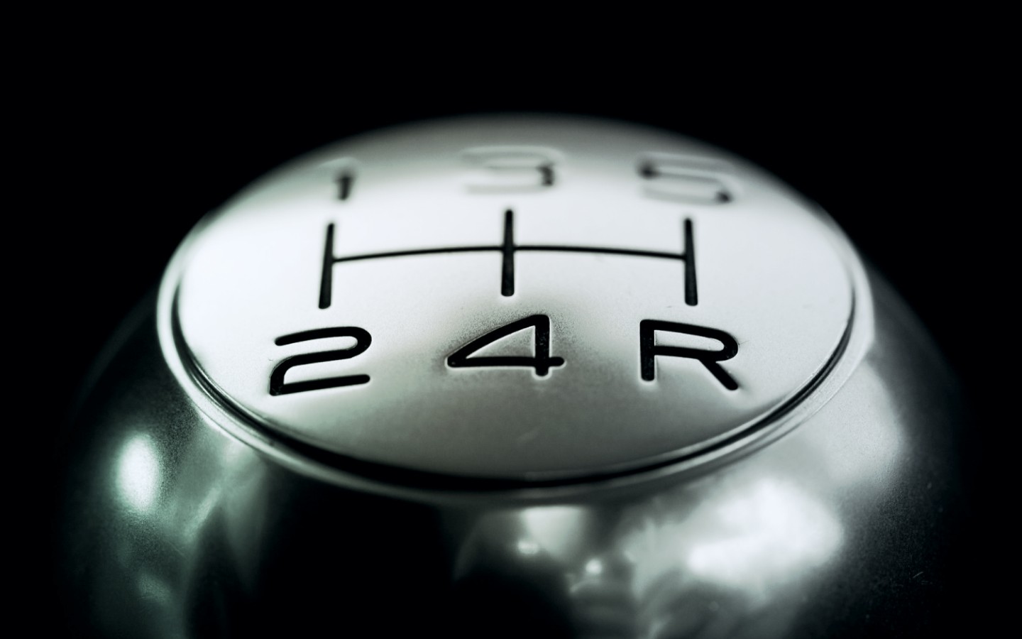 Close up picture of a gearbox against black background