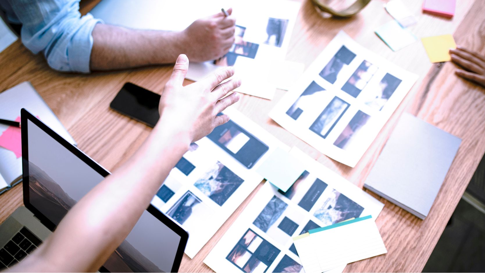 User experience designers collaborating on a table