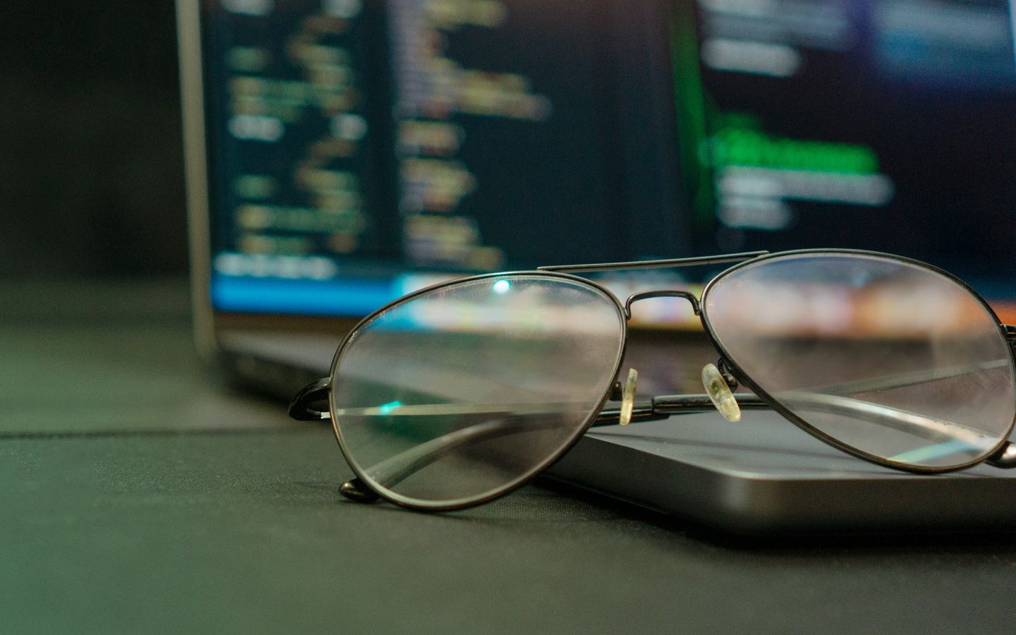 Close up shot of glasses on a laptop.