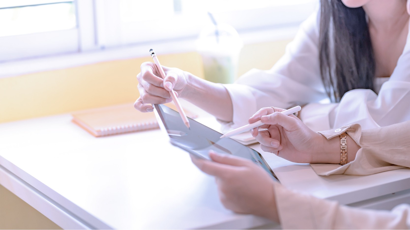 Hands at keyboard comparing software systems and features