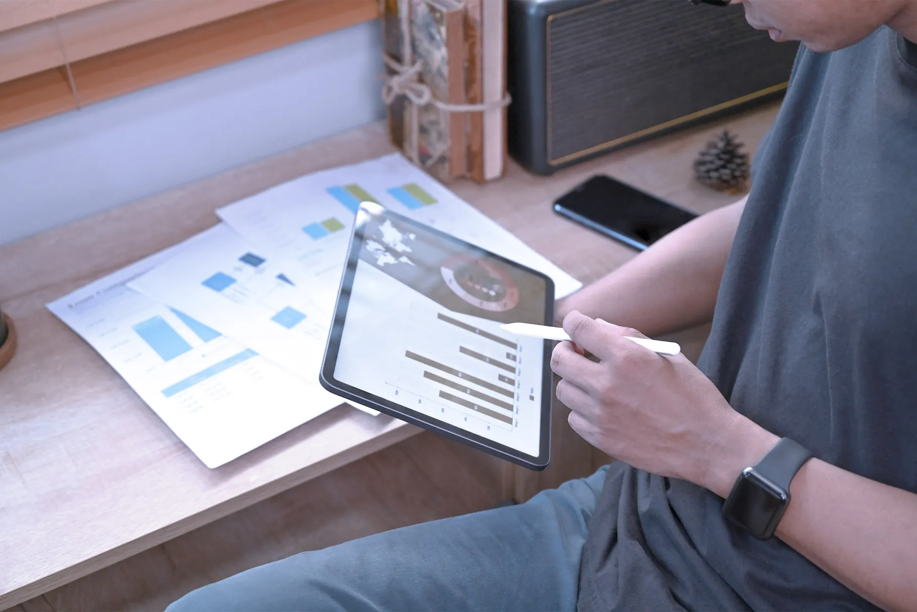 Colleague inspecting graph on a tablet